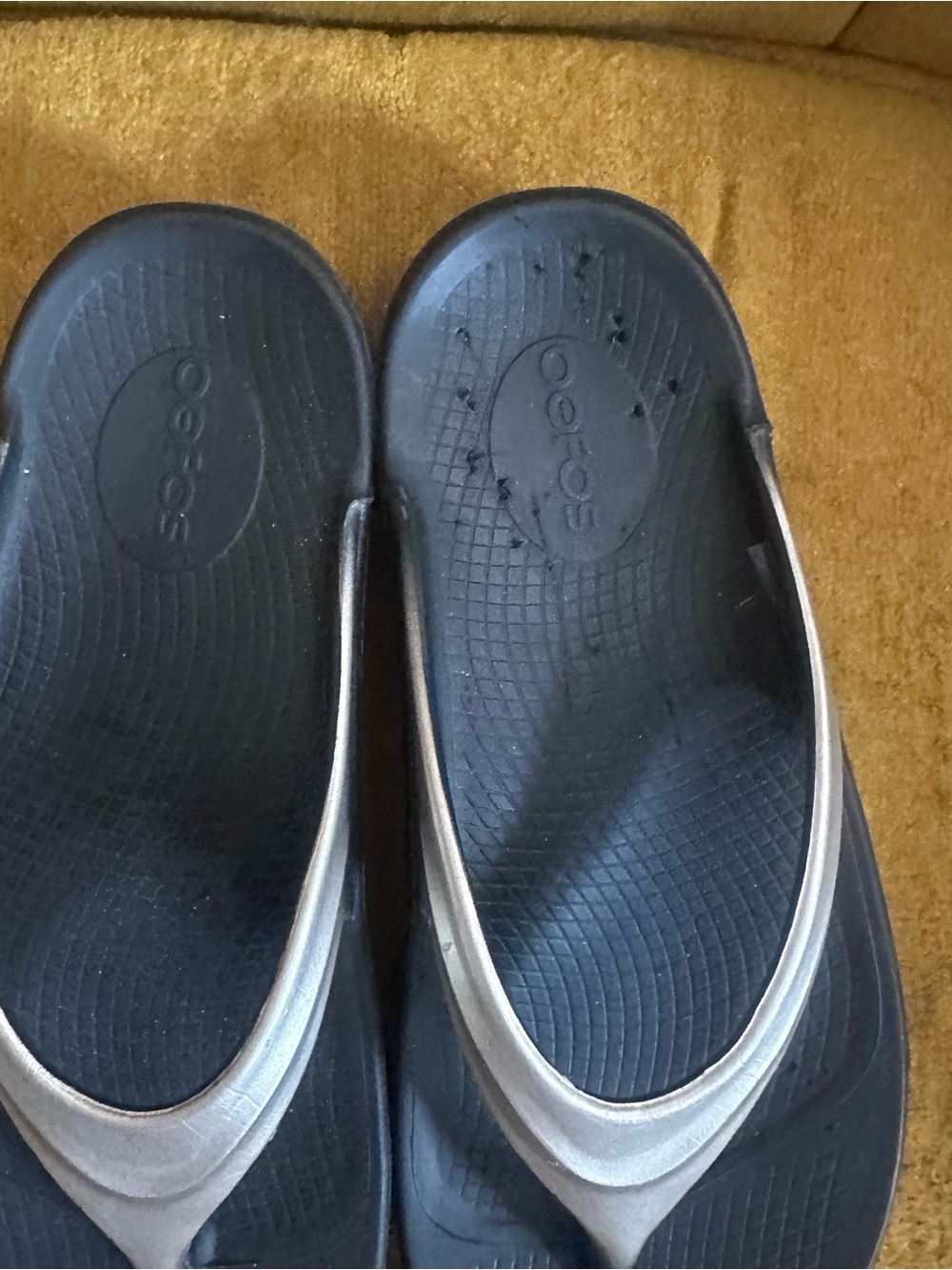 OOFOS Black Flip Flops with Silver Straps